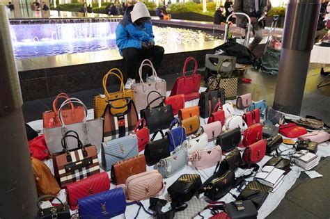 is it legal to sell fake designer bags|selling designer handbags illegal.